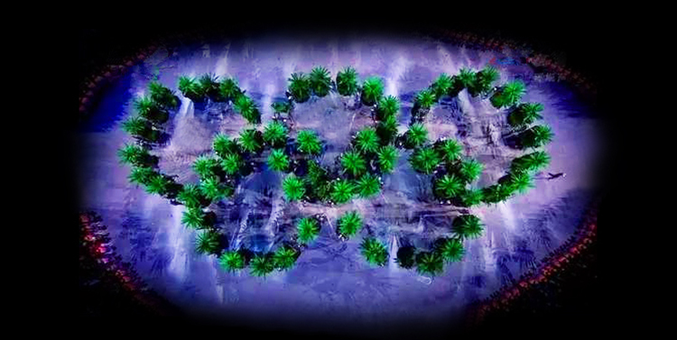 里约奥运开幕式由绿植组成的奥运五环，深色舞台上发光呈现，环保视觉创意