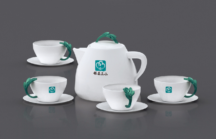 怀柔三小绿色枝叶纹样陶瓷茶具器物设计，体现校园文化品牌雅致气质